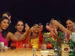 bachelorette party Jaco Beach Costa Rica — women toasting at private chef dinner in villa