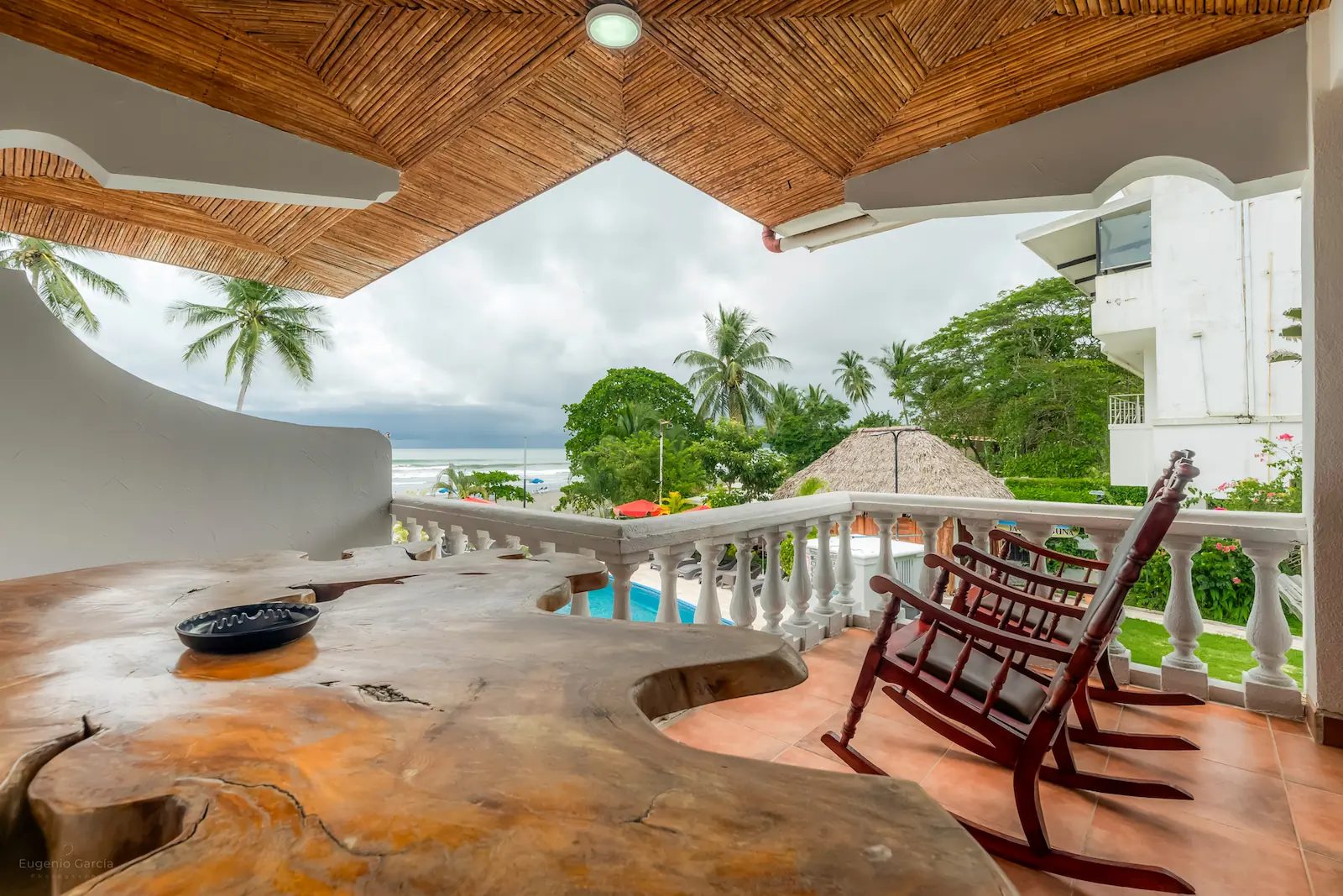 Private terrace with rocking chairs and ocean view — VIP Wedding Venue Jacó Beach
