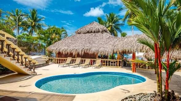 Pool with water slide and Tiki palapa — Private Resort Jacó Beach Costa Rica
