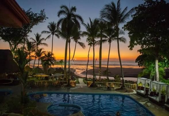 Sunset pool view at Private Resort — VIP Wedding Venue South End Jacó Beach