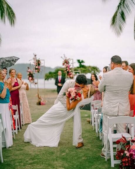 wedding planner Jaco Beach — beachfront wedding ceremony with guests, destination wedding travel Jacó Costa Rica