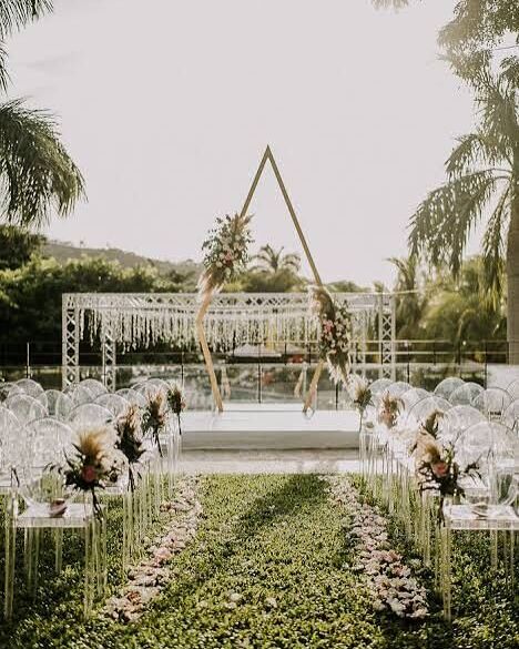Wedding planning Jacó Beach — modern arch ceremony venue Costa Rica