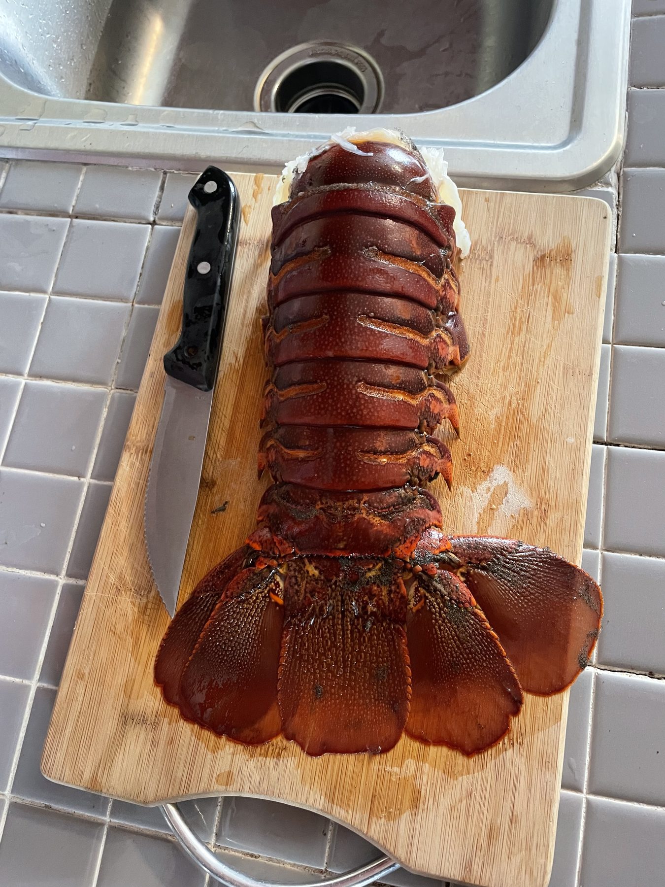 Fresh lobster being prepared for a Jaco Beach dinner