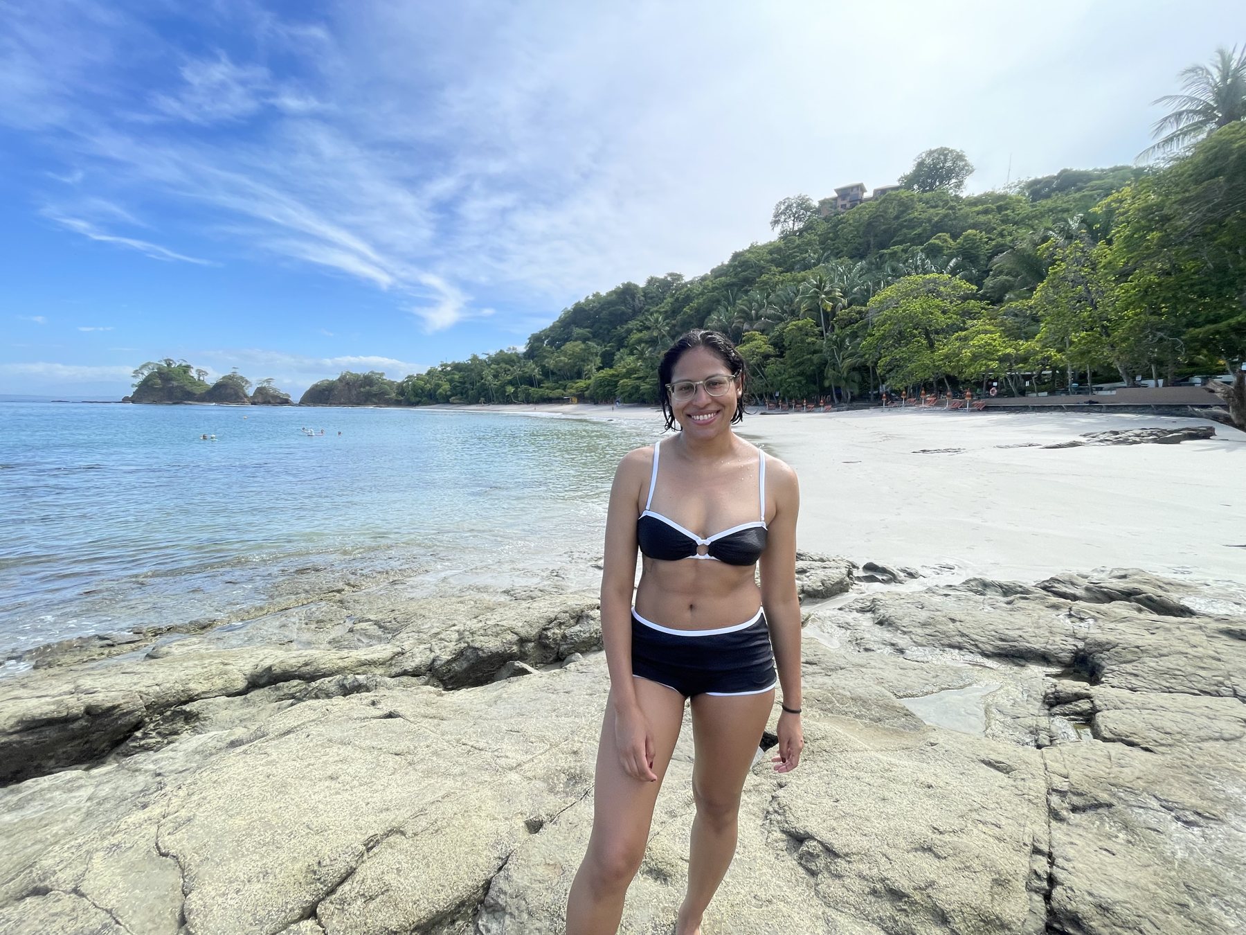 White-sand beach and calm turquoise water at Playa Mantas near the Punta Leona building lot — best places to buy near Jaco Beach