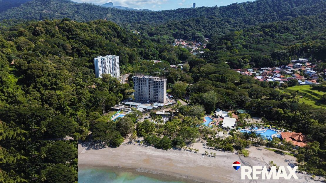 Living area in Punta Esmeralda beachfront condo, Punta Leona — Jaco Beach real estate, 2023 build