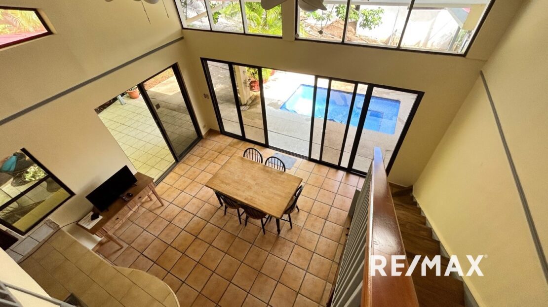 Room inside 3-bedroom Alpairo house at Punta Leona — split A/C, hot water, washer dryer, real estate Jaco area