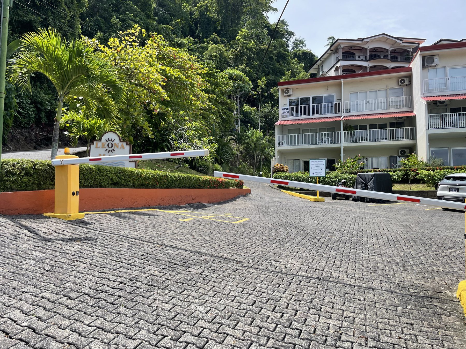 The gated, guarded entrance to the oceanfront condo community