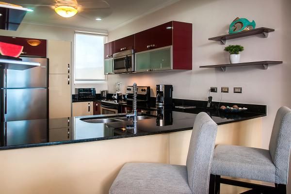 Condo VIP 14 — The Palms 704 beachfront condo in Jacó Beach