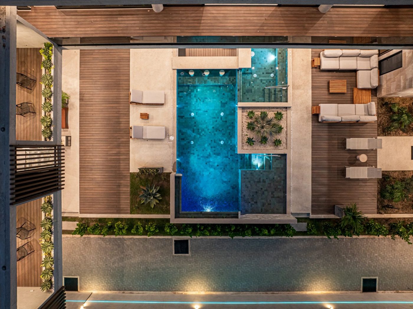 Casa VIP 1 luxury beachfront villa in Jacó — pool deck with loungers