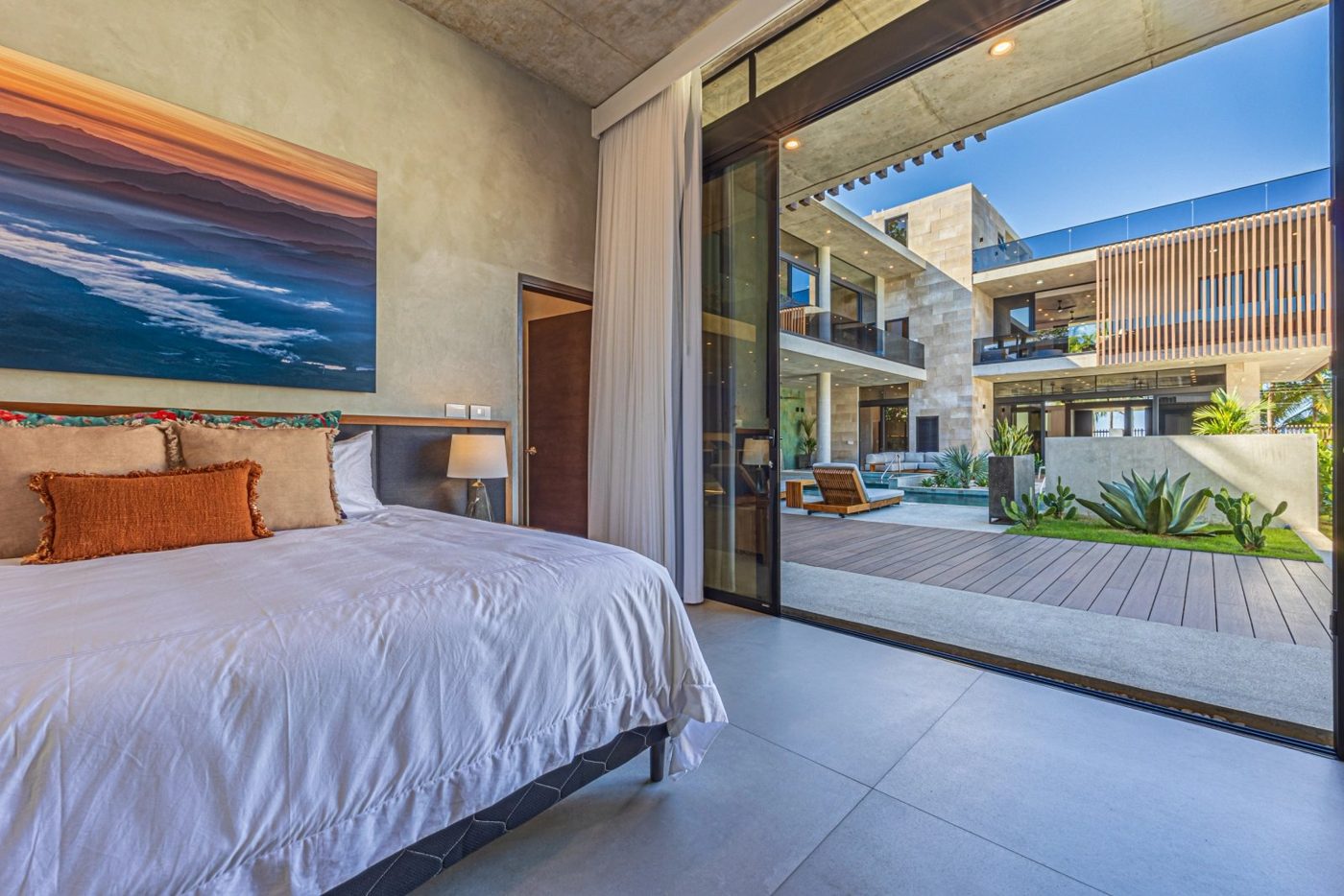 Casa VIP 1 luxury beachfront villa in Jacó — poolside palms
