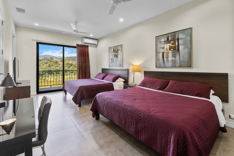 Casa VIP 10 — 10-suite jungle villa in Jacó, luxury suite, pool area or villa grounds
