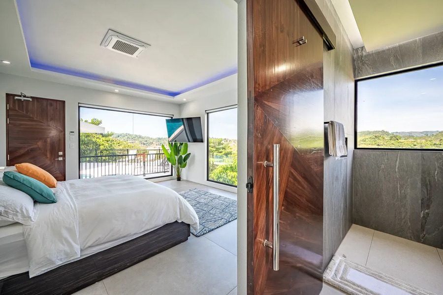 Casa VIP 11 — 7-suite jungle villa in Jacó, luxury suite, pool area or villa grounds