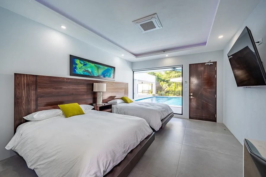 Casa VIP 11 — 7-suite jungle villa in Jacó, luxury suite, pool area or villa grounds
