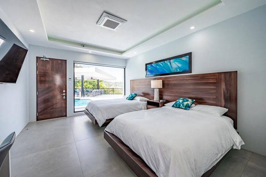 Casa VIP 11 — 7-suite jungle villa in Jacó, luxury suite, pool area or villa grounds