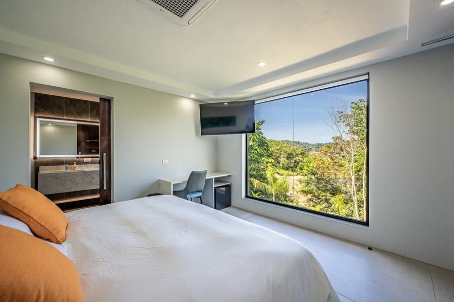 Casa VIP 11 — 7-suite jungle villa in Jacó, luxury suite, pool area or villa grounds