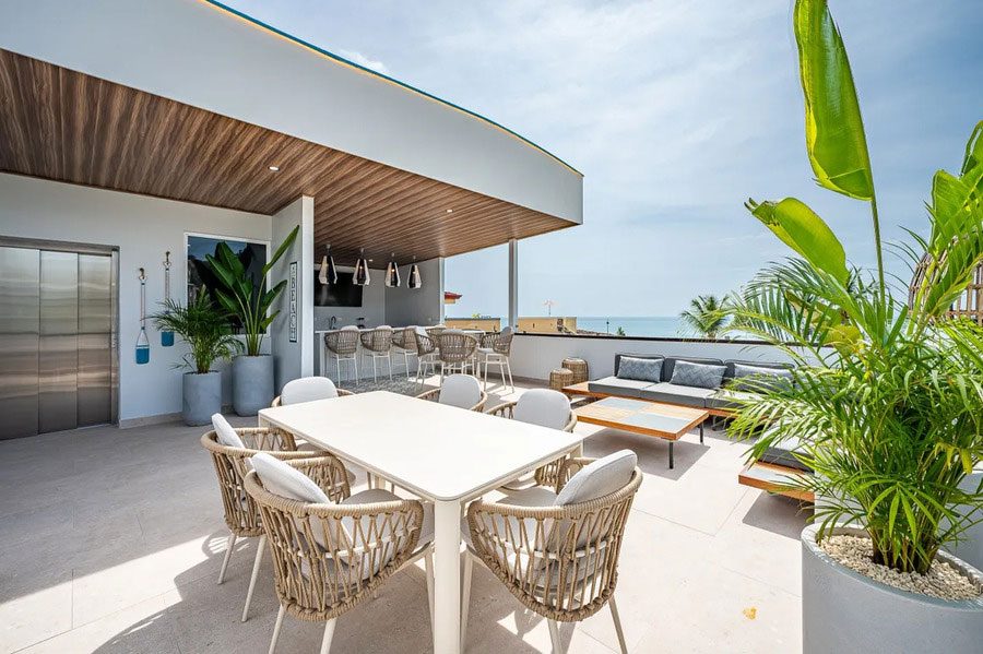 Casa VIP 12 — 10-suite beachfront villa in Jacó, luxury suite, living space or villa view
