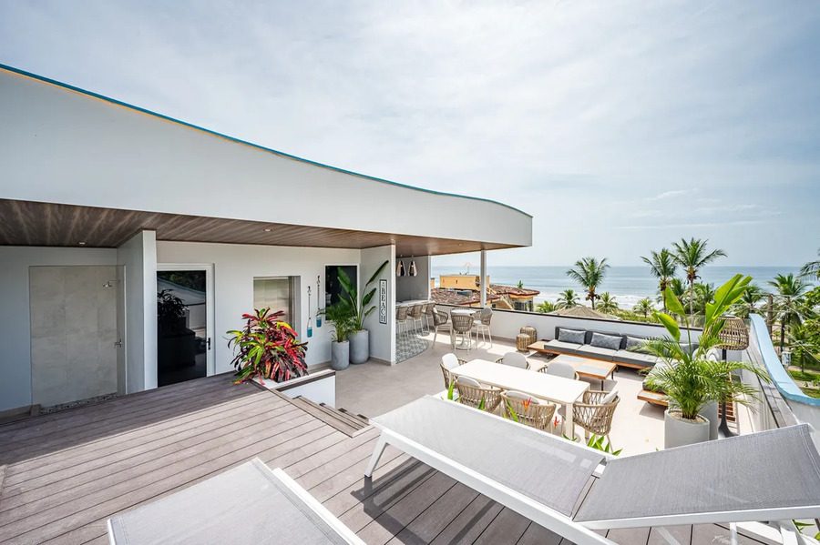 Casa VIP 12 — 10-suite beachfront villa in Jacó, luxury suite, living space or villa view
