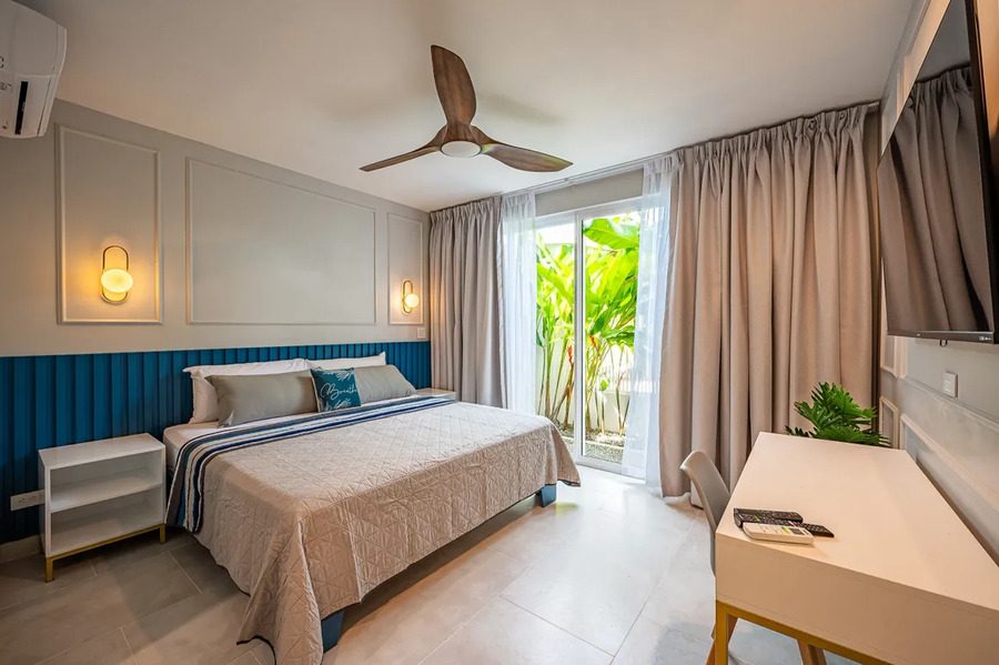 Casa VIP 12 — 10-suite beachfront villa in Jacó, luxury suite, living space or villa view