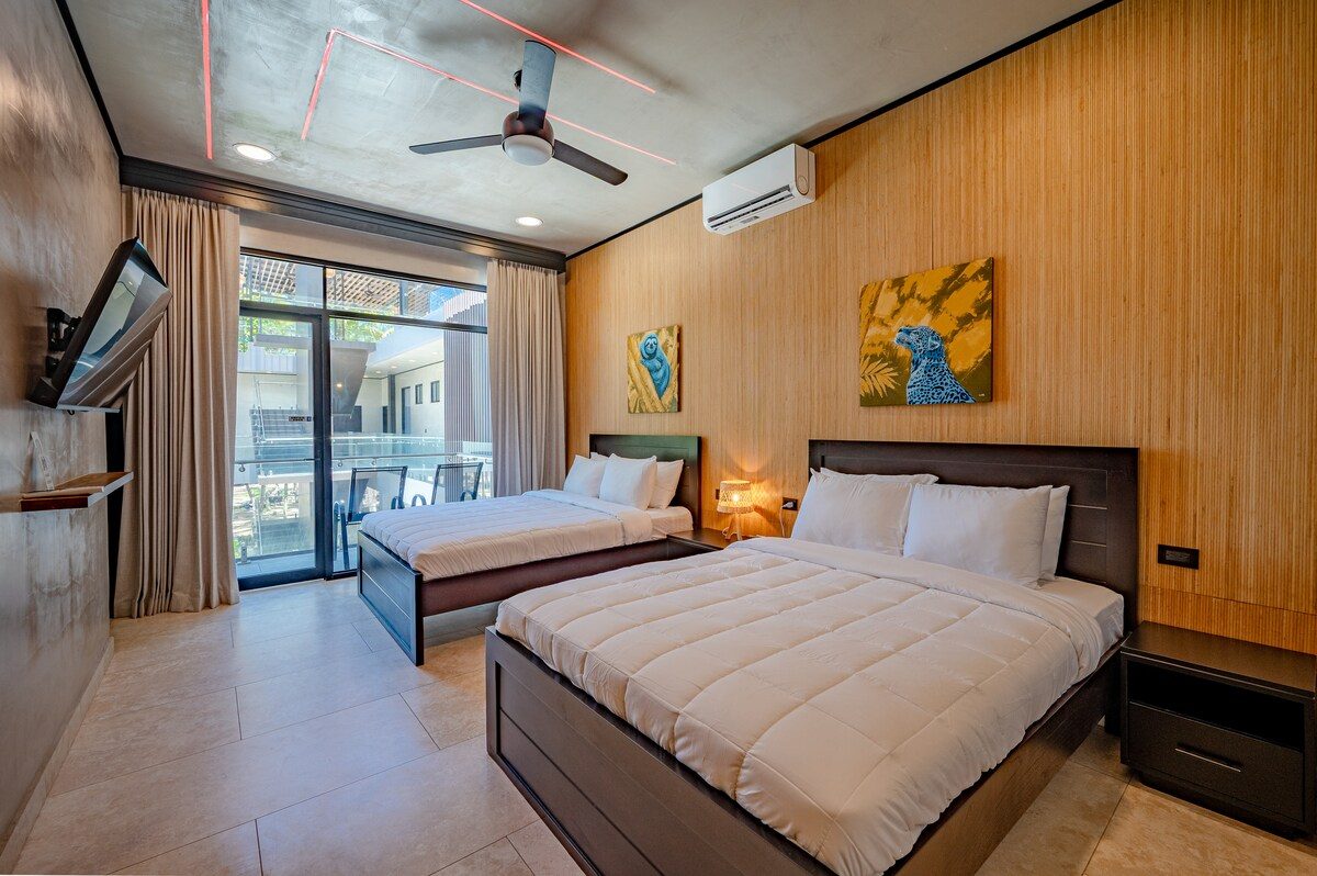 Casa VIP 2 — 15-bedroom beachfront estate in Jacó Beach, bedroom with garden view