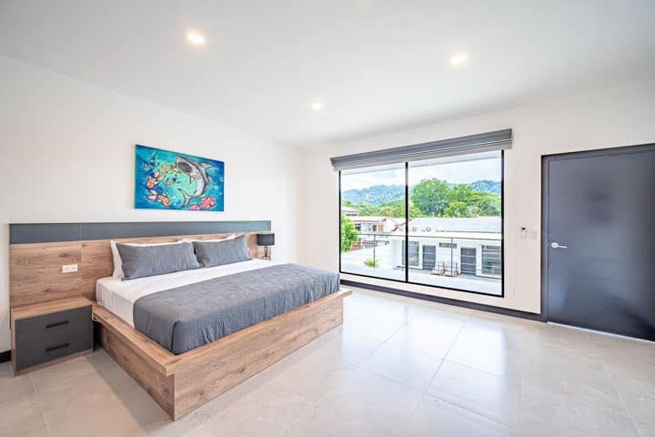 Casa VIP 5 — 13-bedroom beachfront villa in Jacó Beach, hallway and stairs