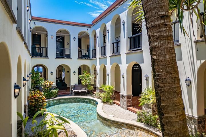 Casa VIP 7 — 9-bedroom beachfront villa in Jacó Beach, tropical courtyard from above