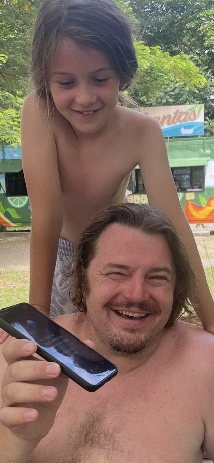 A happy guest and his son in Jacó