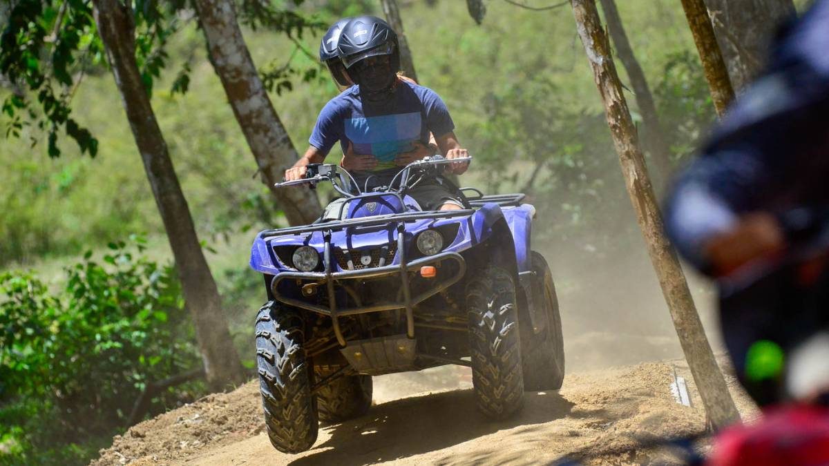 ATV on a dirt road near Punta Leona, Costa Rica