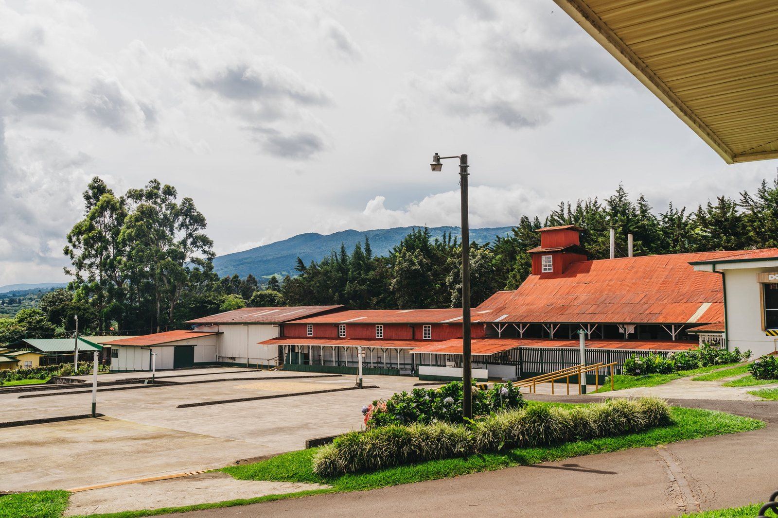Aerial view of a highland coffee hacienda and mountains