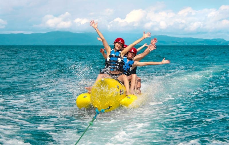 Banana boat ride in the clear water off the island