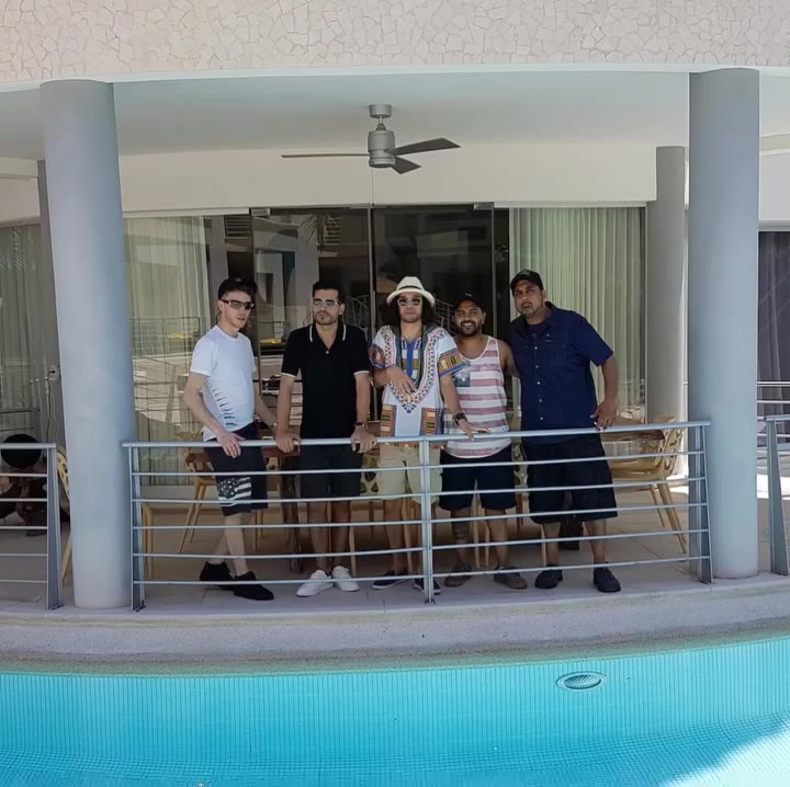 A bachelor party group on the balcony of their villa in Jaco Beach Costa Rica